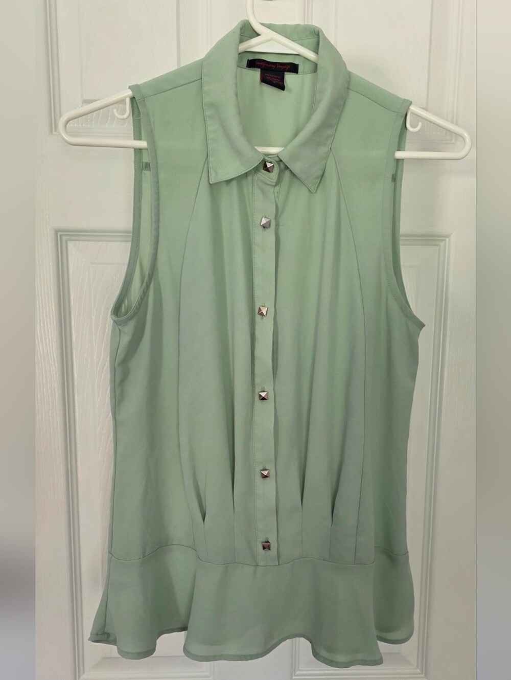 Imaginary Voyage Sleeveless Button-Front Peplum Blouse